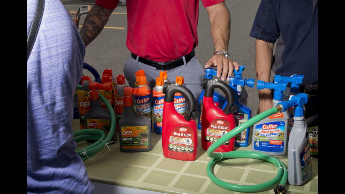 Products are displayed at a Home Depot parking lot during a special Zika Action Day. The health fair included public-health experts and workshops.