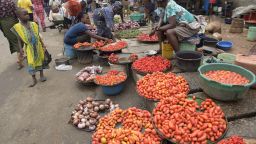 Vendors display tomatoes and pepper at Mile 12 market in Lagos, on June 21, 2016.  
Ordinary Nigerians are feeling the full effects of spiralling inflation which in May soared to a more than six-year high of 15.6 percent. The cost of living is predicted to rise further after Nigeria this week scrapped the naira's peg to the US dollar, allowing the currency to float. / AFP / PIUS UTOMI EKPEI        (Photo credit should read PIUS UTOMI EKPEI/AFP/Getty Images)