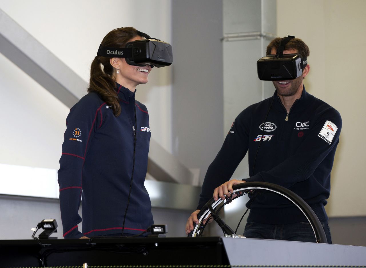 Here the Duchess of Cambridge joins Ainslie on a sailing simulator at his team's Portsmouth base in 2015.