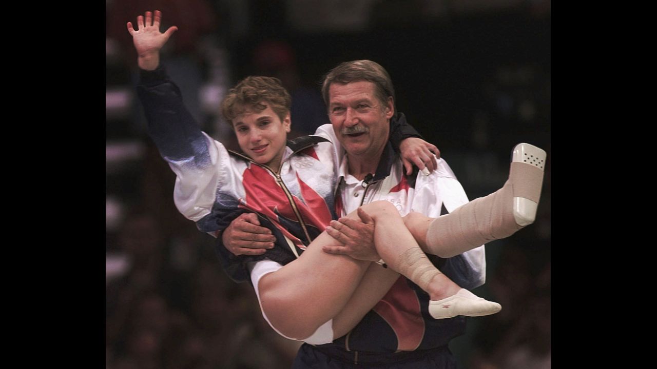 <strong>Strug digs deep: </strong>U.S. gymnast Kerri Strug injured her ankle on her second-to-last vault during the team competition at the 1996 Summer Games in Atlanta. But with a gold medal in the balance, she still had to go once more and land on her feet. She did just that, clinching victory and making her an American hero.