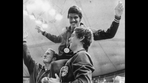 <strong>Spitz wins seven: </strong>Before Michael Phelps, there was Mark Spitz. Spitz, seen here on the shoulders of American teammates Tom Bruce and Mike Stamm, won seven swimming events at the 1972 Summer Games in Munich, Germany. It was the most golds won at one Olympics until Phelps won eight in 2008.