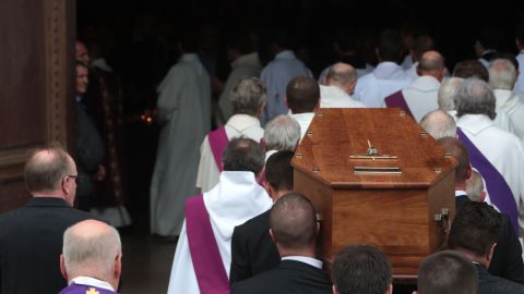Pallbearers carry the coffin of the Rev. Jacques Hamel into Rouen's cathedral Tuesday.