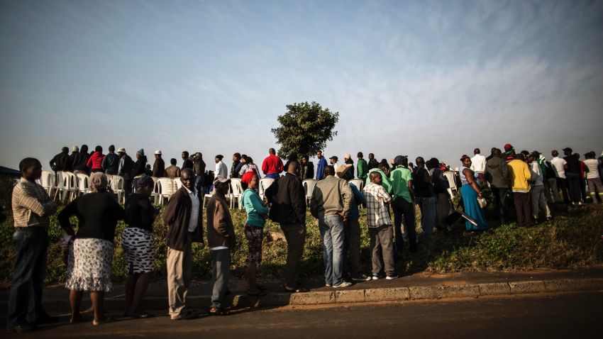 South African voters queue at a polling station in Durban on August 3, 2016.