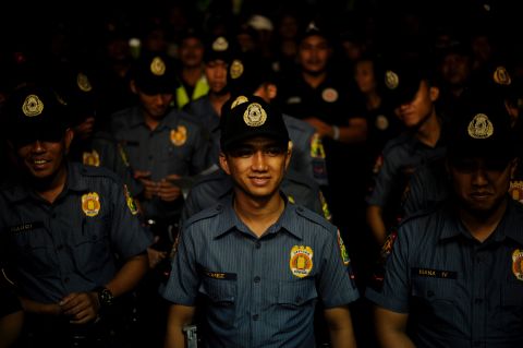 Police officers stand in formation before the start of "Oplan Rody" on June 1, 2016, a law enforcement operation named after President Duterte, whose nickname is Rody.