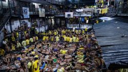 Inmates sleep on the ground of an open basketball court inside the Quezon City jail at night in Manila in this picture taken on July 21, 2016.
There are 3,800 inmates at the jail, which was built six decades ago to house 800, and they engage in a relentless contest for space. Men take turns to sleep on the cracked cement floor of an open-air basketball court, the steps of staircases, underneath beds and hammocks made out of old blankets.  / AFP / NOEL CELIS / TO GO WITH AFP STORY: Philippines-politics-crime-jails, FOCUS by Ayee Macaraig        (Photo credit should read NOEL CELIS/AFP/Getty Images)