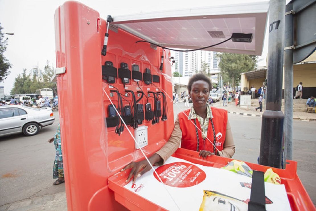 Solar kiosk franchisee, Jeanne Marie Uhiriwe, on the streets of Kigali, Rwanda