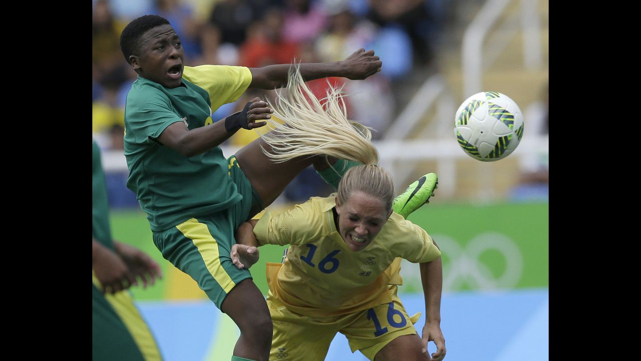 South Africa's Nothando Vilakazi, left, and Sweden's Elin Rubensson compete for the ball during a match on August 3.