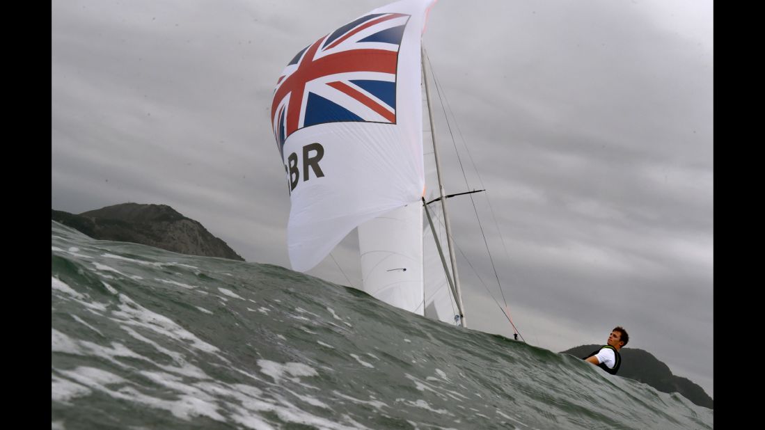 A British sailing crew trains in Rio's Guanabara Bay on August 3.