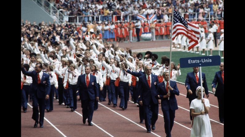 <strong>Montreal, 1976:</strong> It's hard to see, but your eyes do not deceive you. Behind the presidential-candidate neckties is a sea of patriotic neckerchiefs.