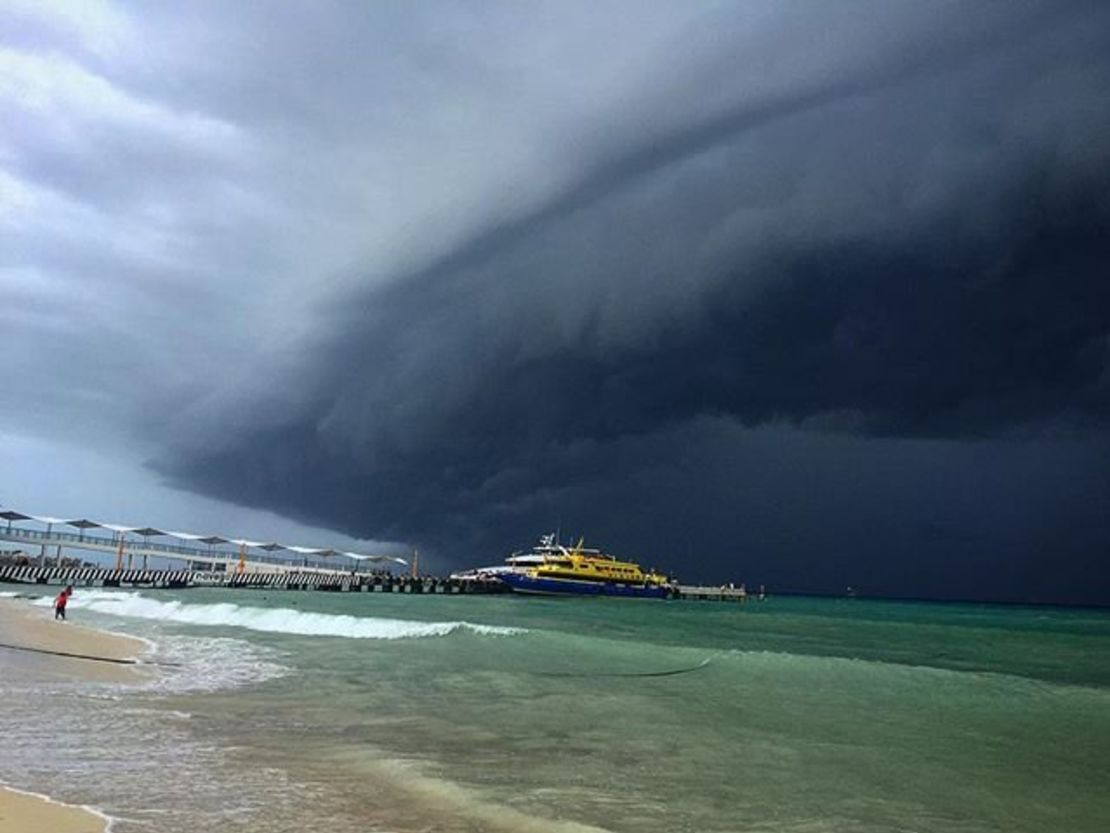 A perfect beach day was halted as ominous dark clouds from Hurricane Earl have made their way to Playa del Carmen, Mexico. 