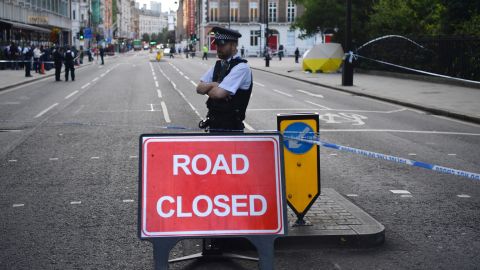 A police officer guards the scene of the knife attack Thursday at Russell Square in London.