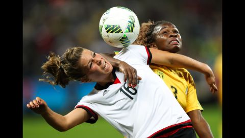 Germany's Malanie Leupolz, left, competes against Zimbabwe's Sheila Makoto during a match in Sao Paulo, Brazil, on August 3. The Olympic soccer tournament is already underway.