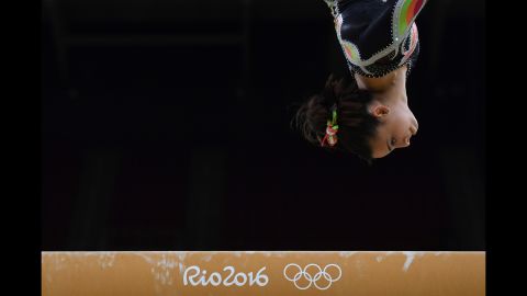 Panama's Isabella Amado practices on the balance beam on August 4.