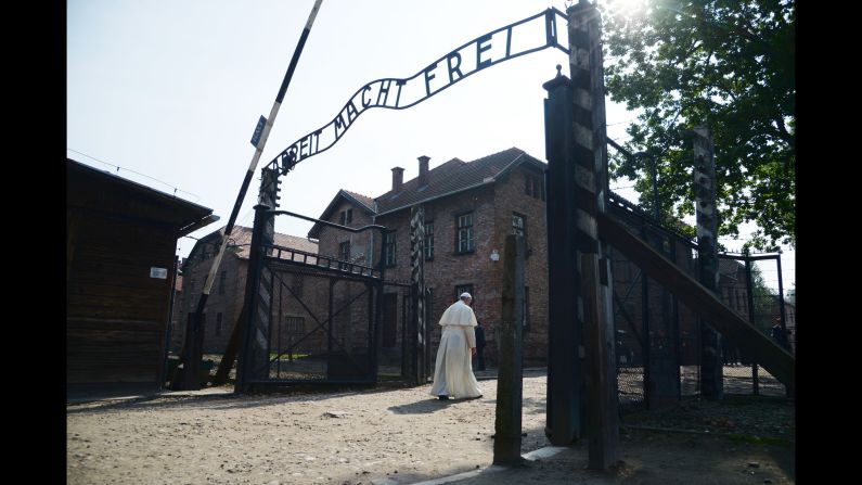 Pope Francis passes the main entrance to Auschwitz-Birkenau, the former concentration camp in Poland, on Friday, July 29, 2016. The Pope <a href="index.php?page=&url=http%3A%2F%2Fwww.cnn.com%2F2016%2F07%2F29%2Feurope%2Fpoland-pope-auschwitz-visit%2F" target="_blank">was there to pay tribute</a> to those who died in the Holocaust.