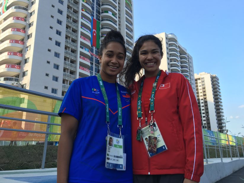 Swimmers Irene Prescott (right) and Evelina Afoa, of Tonga and Samoa respectively, are staying in the same building as the Australians, although they didn't experience any problems with the facilities upon their arrival in Brazil.