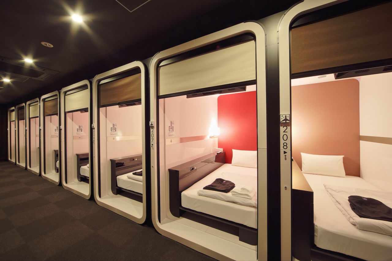 First Cabin represents minimalist compact living in  luxurious form. Behind the door -- a pull-down shutter --  is a bed, a 32-inch flat screen TV and a safe. Slightly smaller than the First Class capsule, the Business Class capsule is also clean, comfortable and very cozy.