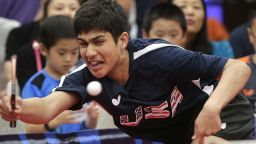 FILE - In this June 18, 2016, file photo, Kanak Jha of the U.S. returns a shot during an exhibition table tennis match in Dunellen, N.J. China's overwhelming domination of table tennis at the Olympics will likely continue in Rio, but there's drama about just which member of the fantastically talented Chinese national team will prevail. The United States has never medaled in table tennis, but there is excitement about the future. Kanak Jha, now 16, was the youngest male to qualify for table tennis in Olympic history when he made the U.S. team in April while still 15. (AP Photo/Julie Jacobson, File)