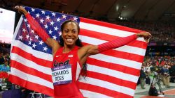 LONDON, ENGLAND - AUGUST 05:  Sanya Richards-Ross of the United States celebrates winning gold in the Women's 400m Final on Day 9 of the London 2012 Olympic Games at the Olympic Stadium on August 5, 2012 in London, England.  (Photo by Alexander Hassenstein/Getty Images)