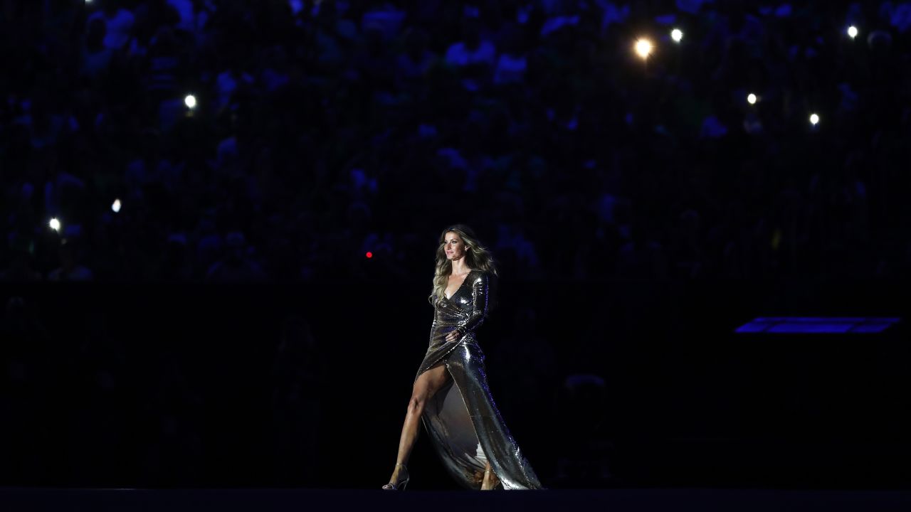 Brazilian supermodel Gisele Bundchen walks on stage at the start of the event.