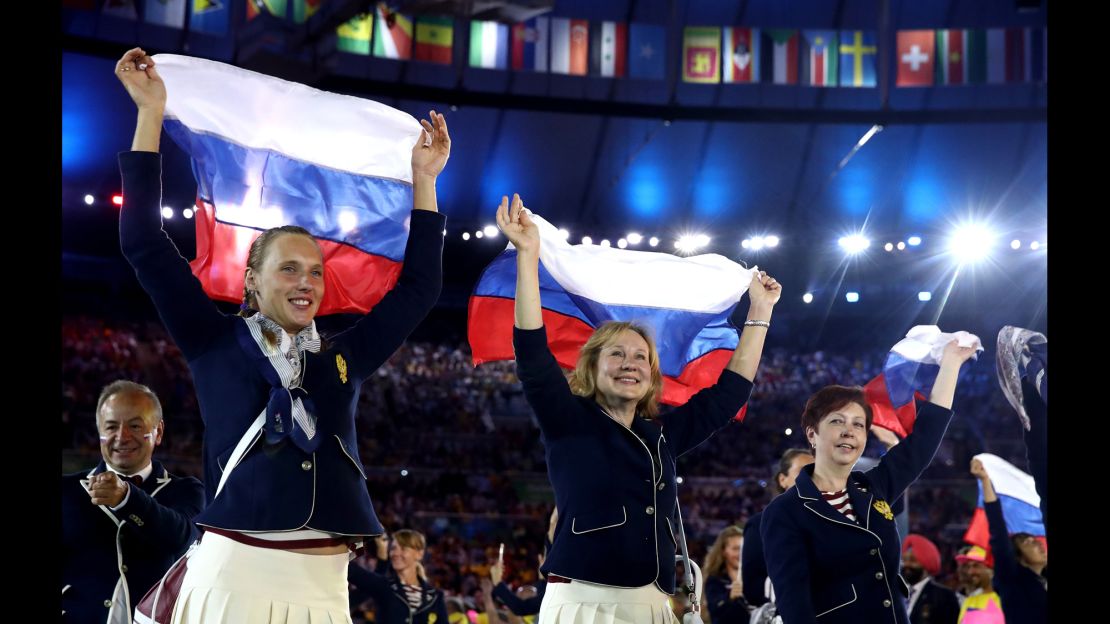 Despite some boos, Russia's athletes were all smiles during the Opening Ceremony. 