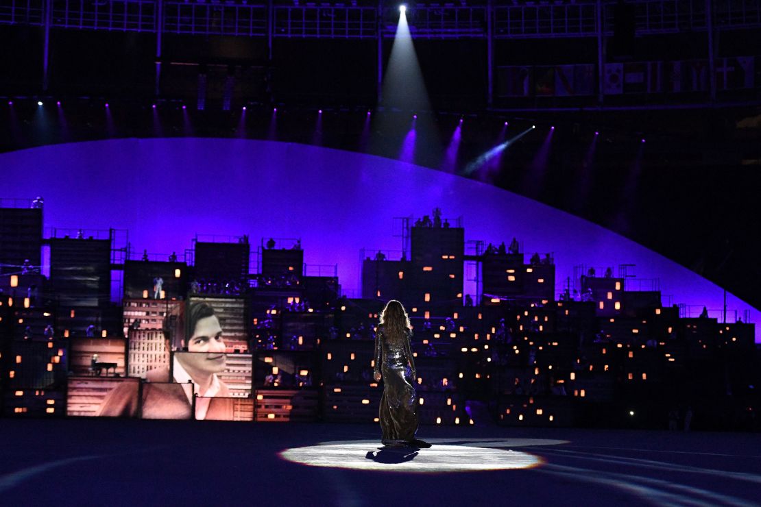 Model Gisele Bundchen struts her stuff at the opening ceremony.