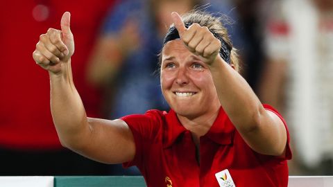 Belgium's Kirsten Flipkens cries after defeating Venus Williams of the United States in the women's tennis competition 4-6, 6-3, 7-6.
