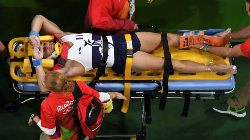 An overview shows France's Samir Ait Said being stretchered off after being injured while competing in the qualifying for the men's vault event of the Artistic Gymnastics at the Olympic Arena during the Rio 2016 Olympic Games in Rio de Janeiro on August 6, 2016. / AFP / Antonin THUILLIER        (Photo credit should read ANTONIN THUILLIER/AFP/Getty Images)