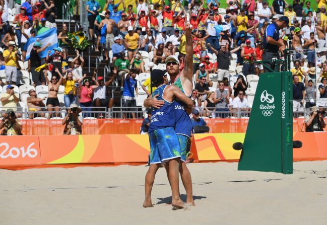 The Brazilian men's pairing of Bruno Schmidt (left) and Alison Cerutti gave the home fans something to cheer by beating Canada in the second match of the opening day.