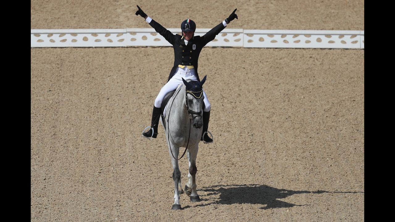 Pietro Roman of Italy riding Barraduff reacts after competing in the Eventing Team Dressage event.