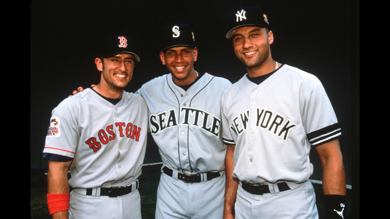 Rodriguez, center, poses with Nomar Garciaparra, left, of the Boston Red Sox, and future teammate Derek Jeter of the Yankees on July 11, 2000 in Atlanta, Georgia.