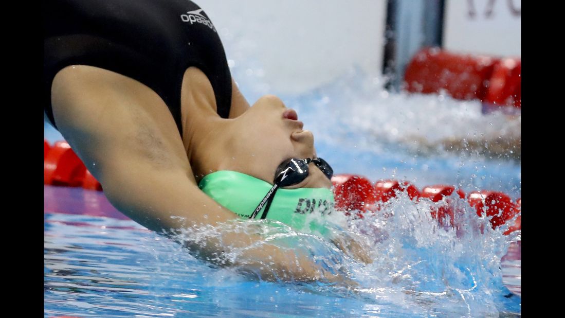 Nepal's Gaurika Singh, 13, competes in -- and wins --  her women's 100m backstroke heat. 