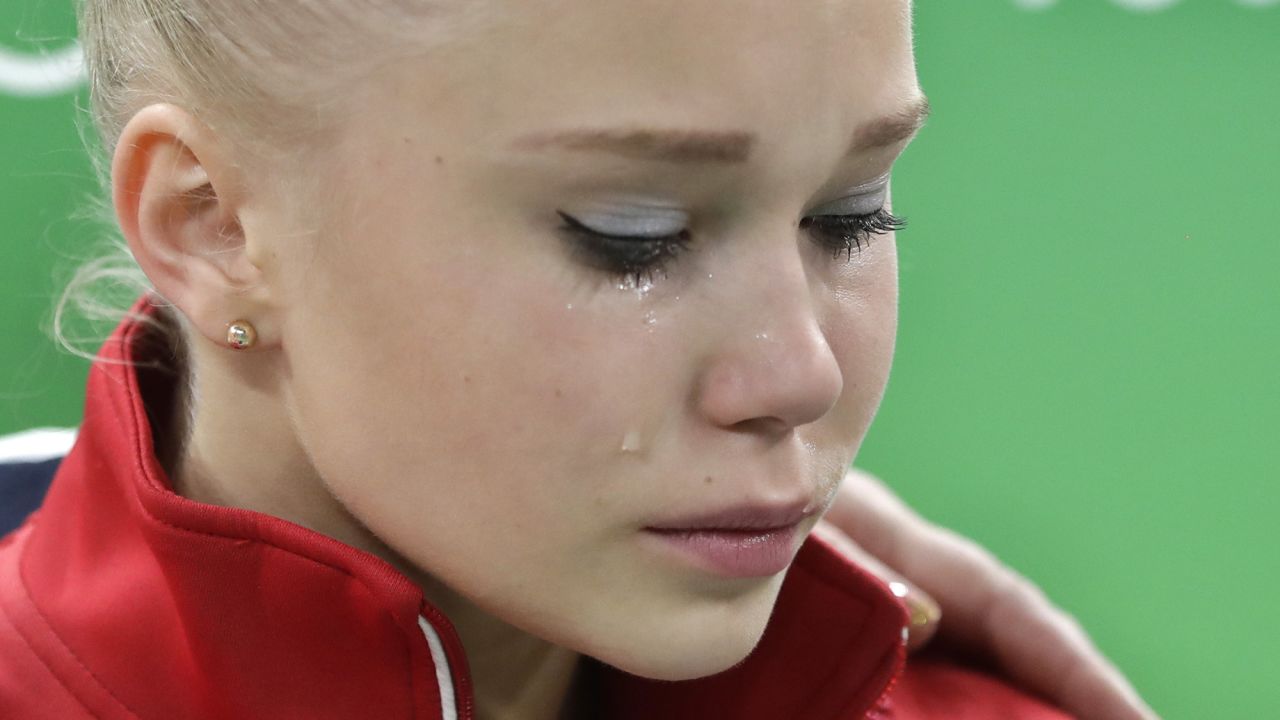 A tear runs down the face of Russia's national all-round champion Angelina Melnikova as she leaves the arena after failing to qualify for the final of the artistic gymnastics women's competition. 