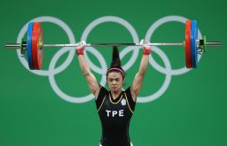  Shu-Ching Hsu of Chinese Taipei competes during the Women's 53kg  weightlifting contest 