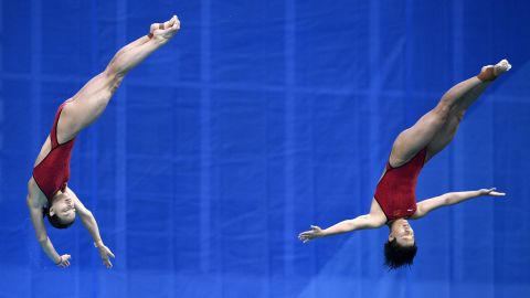 China's Wu Minxia and Shi Tingmao won the women's synchronized 3m springboard final. Wu became the first diver to win five Olympic golds.