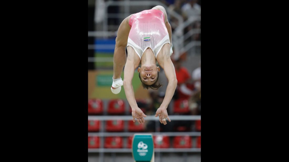 Uzbekistan's Oksana Chusovitina performs on the balance beam during the artistic gymnastics women's qualification round. At 41, she is the oldest gymnast to ever compete in the Olympics.