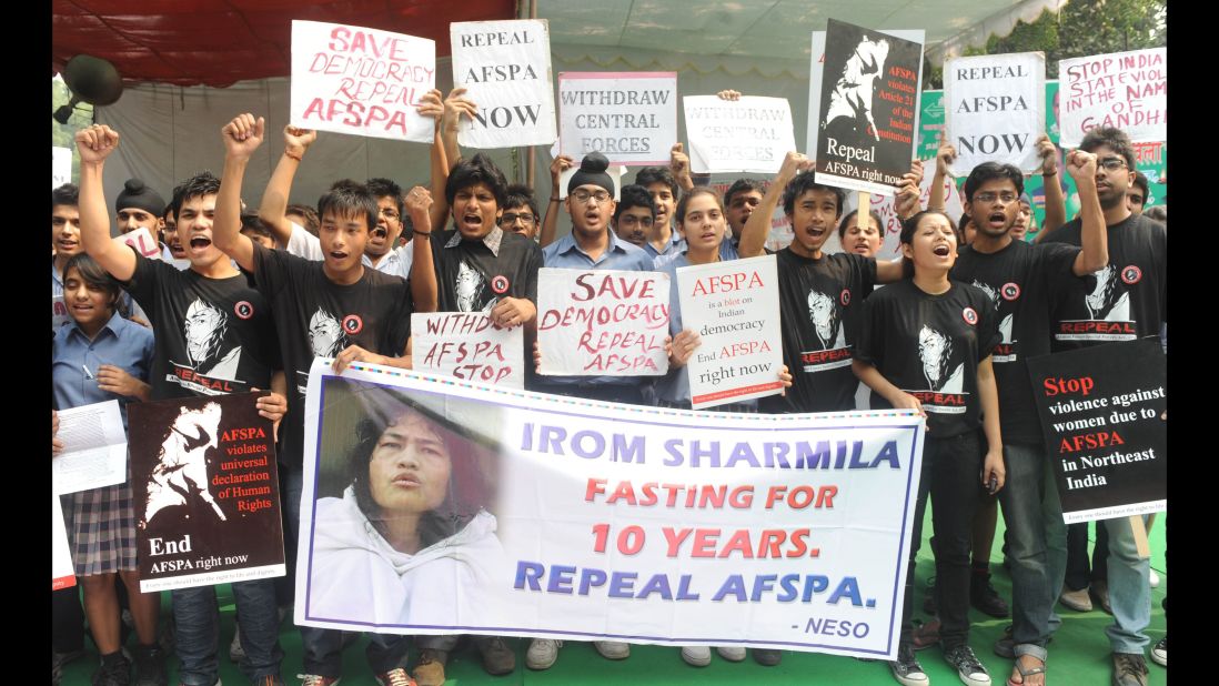 Activists supporting the repeal of the Armed Forces Special Powers Act (AFSPA) shout slogans in support of the rights activist during a protest in New Delhi in November, 2011. 