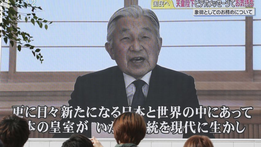 A screen displays Japanese Emperor Akihito delivering a speech in Tokyo, Monday, Aug. 8, 2016. The Japanese emperor, in a rare address to the public, signaled Monday his apparent wish to abdicate by expressing concern about his ability to carry out his duties fully. (AP Photo/Koji Sasahara)