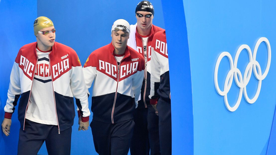 Russia's Andrey Grechin, Danila Izotov, Vladimir Morozov and Alexander Sukhorukov arrive for the men's 4x100-meter freestyle final Sunday.