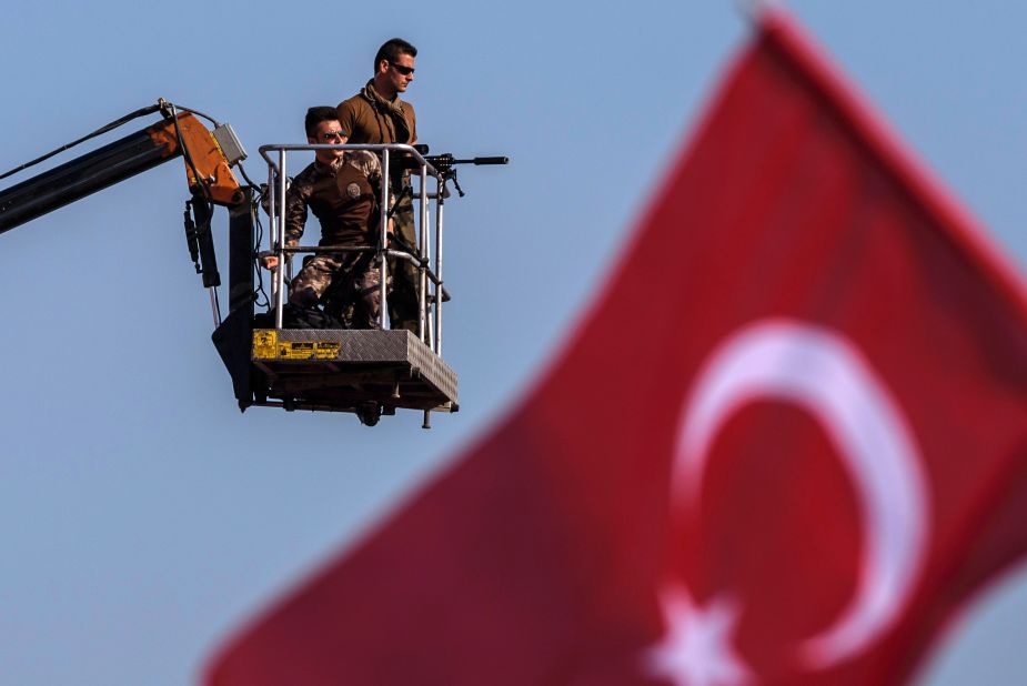 Security was predictably tight -- as these Turkish special forces snipers high above the crowd illustrate.