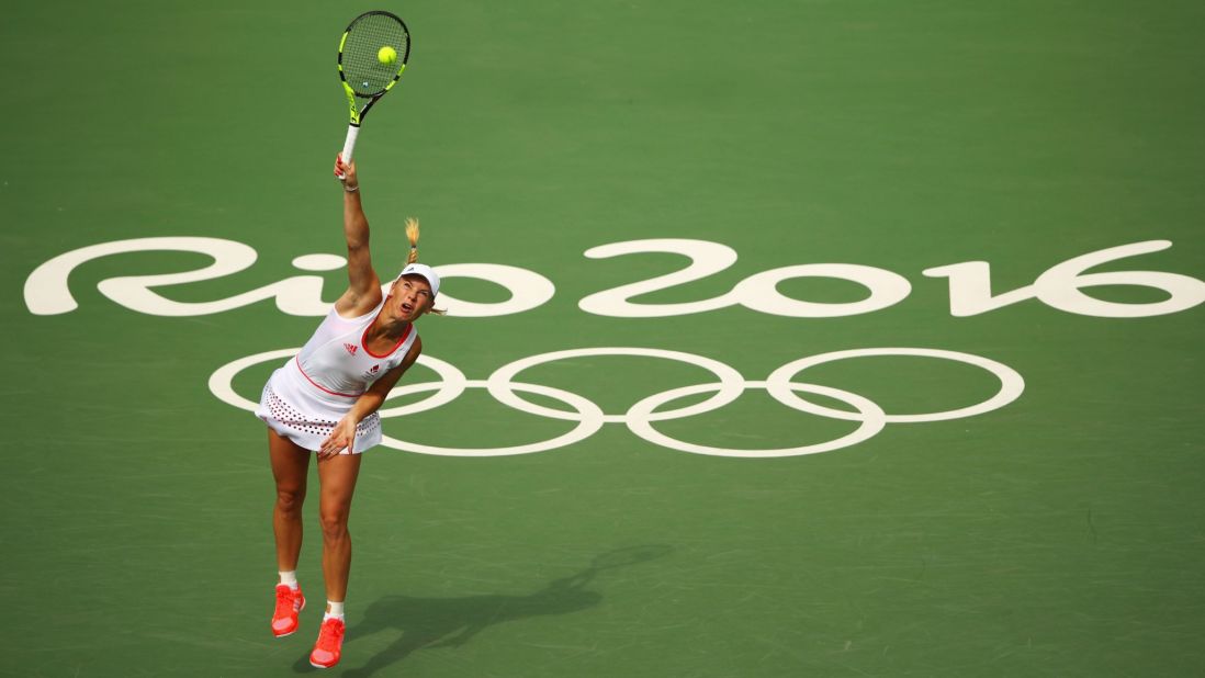 Denmark's Caroline Wozniacki serves during her second-round match against Petra Kvitova of the Czech Republic. Kvitova advanced with a 6-4, 6-2 victory.