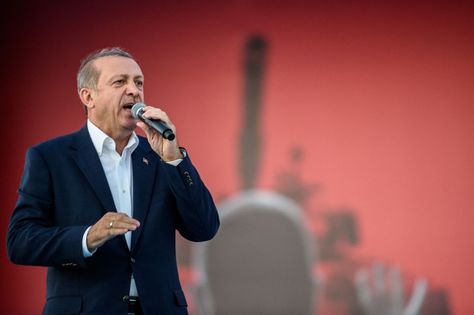 Turkish President Recep Tayyip Erdogan thanks his supporters during a massive rally in Istanbul on August 7 to mark the failed military coup on July 15.
