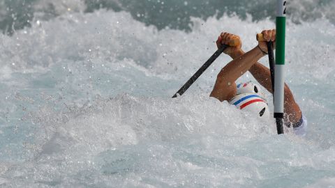 French canoeists Matthieu Peche and Gauthier Klauss compete in the C-2 slalom competition at the Whitewater Stadium.