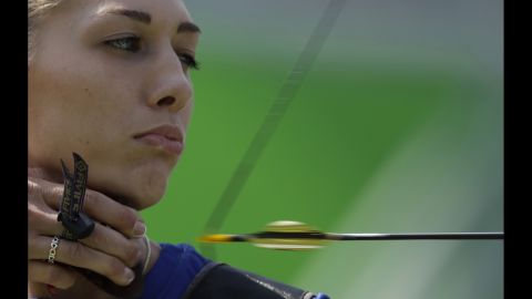 Slovakia's Alexandra Longova releases an arrow during the women's individual archery competition.