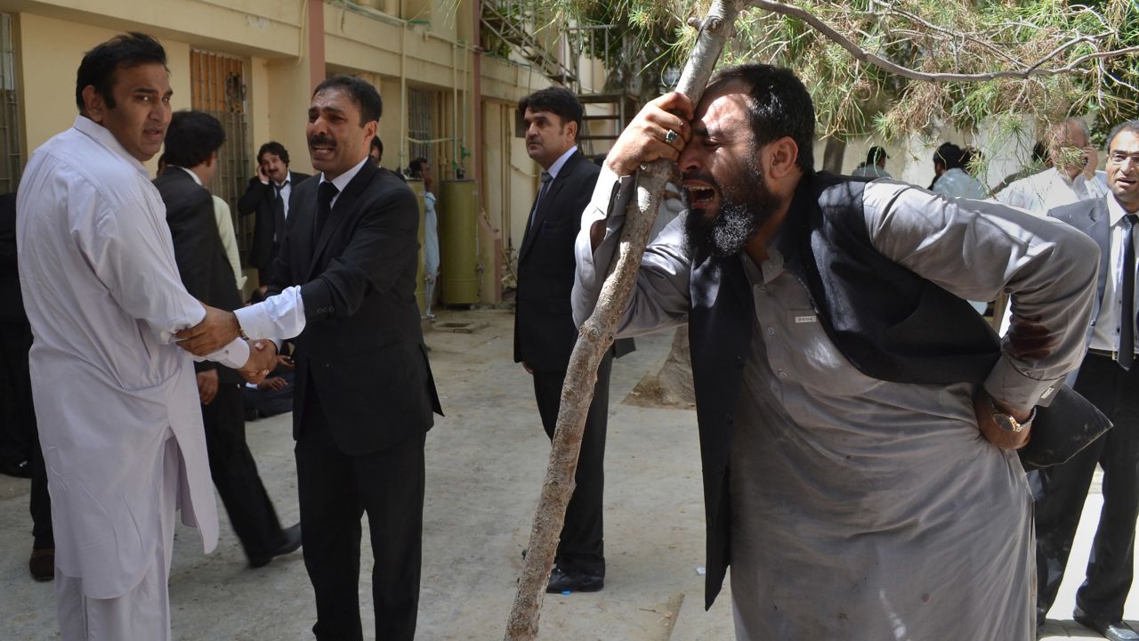 Pakistani lawyers mourn the deaths of their colleagues following a bomb blast in QuettA.
