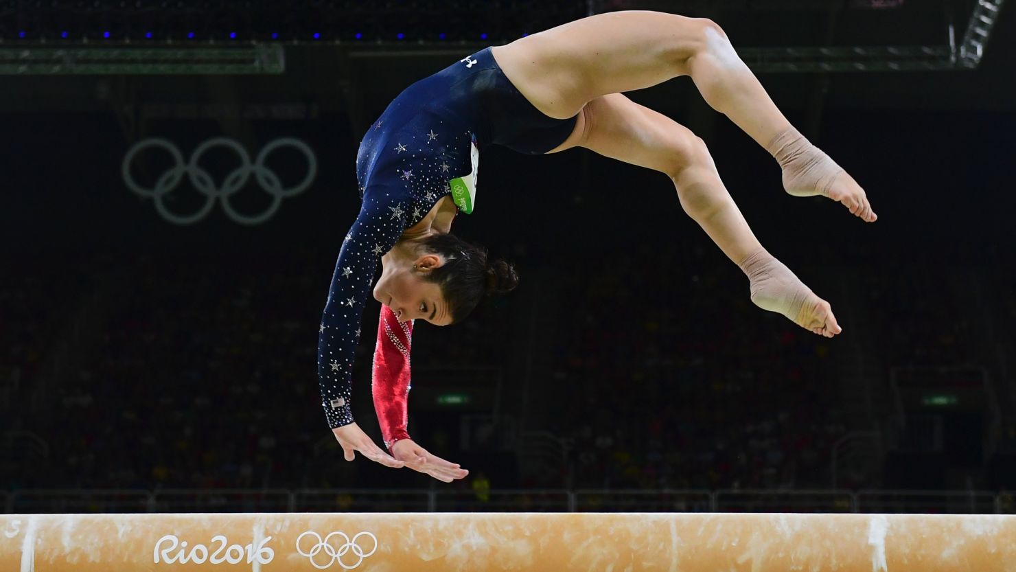 Aly Raisman nails the balancing beam during the women's team all-around preliminaries.