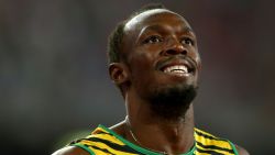 BEIJING, CHINA - AUGUST 27:  Usain Bolt of Jamaica celebrates after crossing the finish line to win gold in the Men's 200 metres final during day six of the 15th IAAF World Athletics Championships Beijing 2015 at Beijing National Stadium on August 27, 2015 in Beijing, China.  (Photo by Cameron Spencer/Getty Images)