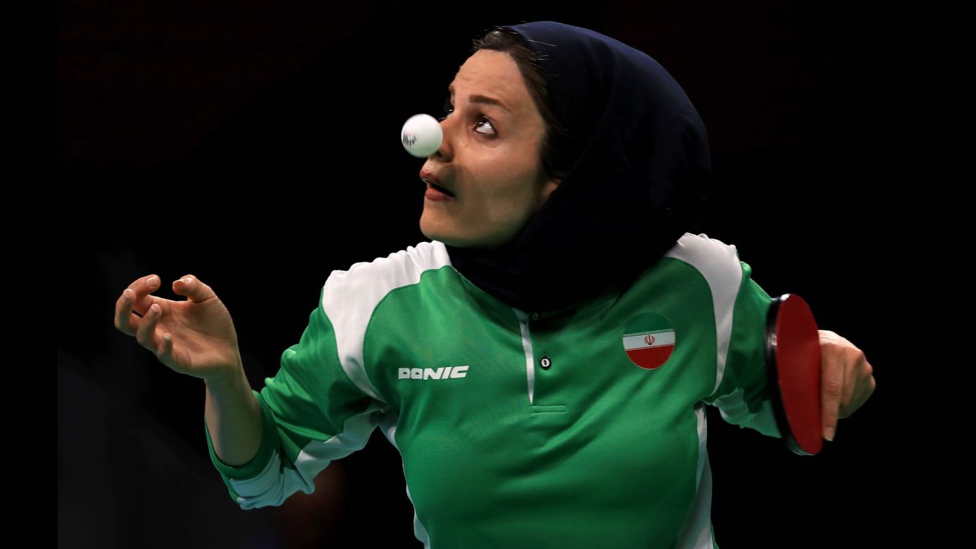 Iran's Neda Shahsavari plays a first-round table tennis match on Saturday, August 6.