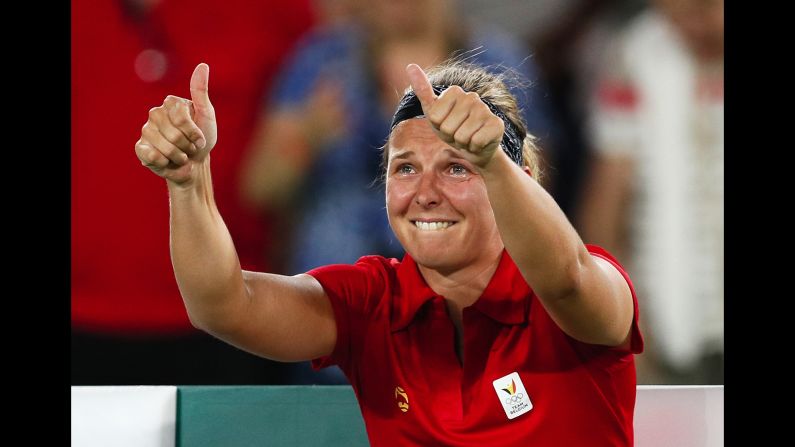 Belgian tennis player Kirsten Flipkens cries after she defeated American Venus Williams on Saturday, August 6.