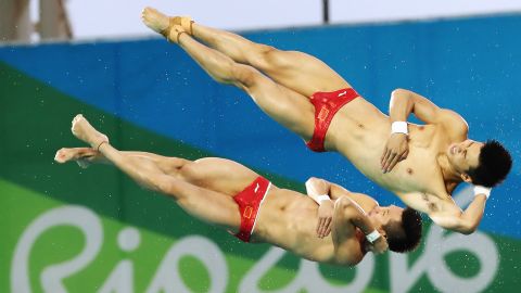 Synchronized divers Chen Aisen and Lin Yue won the 10-meter platform event for China. China has won the event in the past four Olympics. 