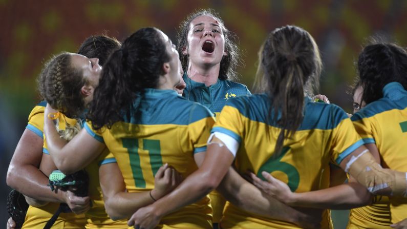 Australian rugby players <a href="index.php?page=&url=http%3A%2F%2Fwww.cnn.com%2F2016%2F08%2F08%2Fsport%2Fwomens-rugby-sevens-new-zealand-australia%2Findex.html" target="_blank">celebrate after defeating New Zealand</a> in the gold-medal match 24-17. This is the first year that rugby sevens has been played at the Olympics.
